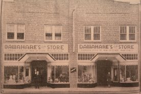 Willie and Nellie Dawahare stand outside the family’s first full-fledged department store in Neon, Kentucky.