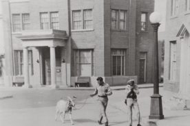 In a rare photo from the collection of Emmett Forrest, Andy Griffith and Don Knotts lead a goat across the set.