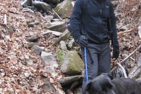 Small falls, old man, black dog in the cold in Poor Mountain Reserve, 3/3/13.