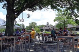 At the Black Sheep, diners eat under a 200-year-old oak.