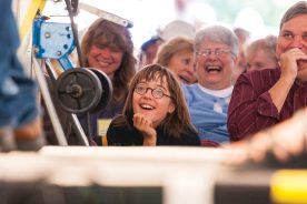 The “side-splitting nature” of Bil Lepp causes listener reactions like on these faces as they they laugh at one of his ridiculous and hilarious stories.