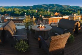 The hotel’s rooftop terrace, affectionately known as The Perch, offers exceptional mountain views.