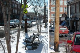 Left: Another view of Grandin Village in the snow. Right: Roanoke's Grandin Road and the Grandin Theater - Morrow's is two doors down. Photo by Stephanie Hardiman.