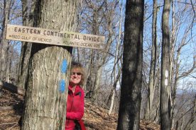 Pretty day, pretty sign, pretty girl.