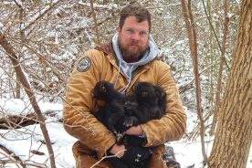 Justin McVey, here at work with cubs as part of an N.C. State/N.C. Wildlife Commission project, talks about bears: “They’re super-adaptable and really smart. If there’s a bear in a habitat with a lot of people, it learns where the food sources are and how to get into a trash can readily.”