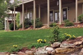 Getting together with neighbors is one of the many pleasures at Cummings Cove. Decks with a view of the golf course, peaks or a soothing koi pond – such as this one in the Wexford neighborhood – are made for easy entertaining.