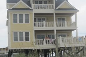 Ben and Gail on one of the three ocean-facing porches at Seascape, the house at Garden City Beach, S.C. 8/10-8/17, 2013