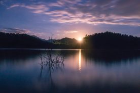 Western North Carolina’s Lake Santeetlah, surrounded by Nantahala National Forest lands, welcomes the rise of a full moon on a summer night.