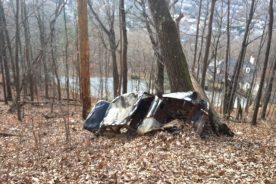 The old black Chevrolet was allegedly found along the wide trail in the '60s and pushed down the hill to where it has rested and rusted ever since.