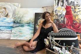 “The Swimming Hole,” to Mistry’s right, is one of the painter’s favorite works, for its calmness.