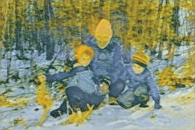 Sam, Granddad and Eli marvel at a sign of wildlife left in the new snow.