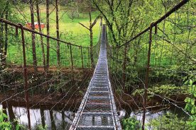 The swinging bridges of Clay County, Kentucky are relics of another time, but unlike some more modern crossings, are largely immune to high water.
