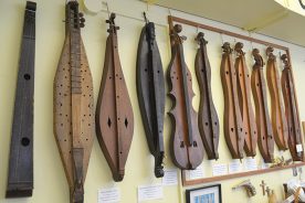 On display inside May's shop are authentic historic instruments, about which Warren happily shares information on styles, woods and techniques through time.