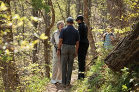 President Barack Obama and First Lady Michelle Obama meet Karen Russell on a hiking trail off the Blue Ridge Parkway near Asheville, N.C.