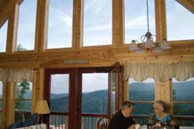 Guests enjoy long-range mountain scenery at each cabin.