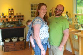 Little Phebe, asleep on the left, joins Andrea Denniston and Seth Guzovsky in their Poor Farm Pottery home site gallery.