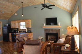 Each of the one-room cabins at White Sulphur Springs is about 750 square feet, with vaulted ceilings and an open, airy feel.