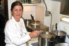 The late Shirley Fuller, the granddaughter of Charlie Zarzour, works in the Zarzour’s’s kitchen in 2007.