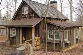 Each cabin has a covered porch that extends the living space into the outdoors.
