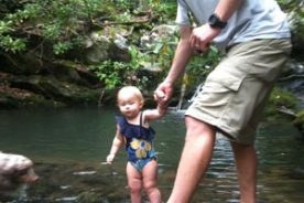 Little Reese didn't jump in, but did get into the cold water, while Daddy Ben jumped in later.