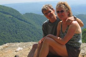 Pre-geezer hikers block the hazy view from Barney's Wall.