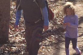 Kurt and Ava walk a trail at Carvins Cove Natural Reserve.