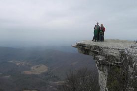Matthew and Aden, Papa and Gigi at McAfee Knob, February 4, 2012, pre-rain.