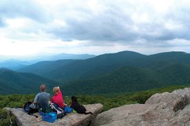The magic of a candid photo is even more poignant when it’s against a backdrop of Virginia mountains and sky.
