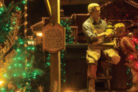 The sculpture of a craftsman gets a holiday treatment at Dollywood in Pigeon Forge, Tennessee.