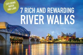 The Market Street Bridge and downtown Chattanooga reflect on a calm-surfaced Tennessee River.